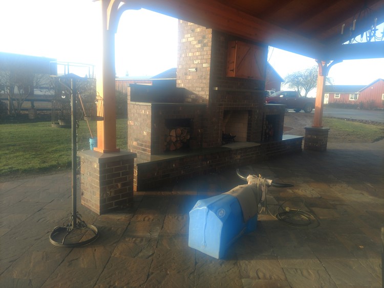 fireplace  with wood  storage areas 