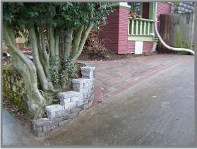 sand paver walkway with dry stack wall